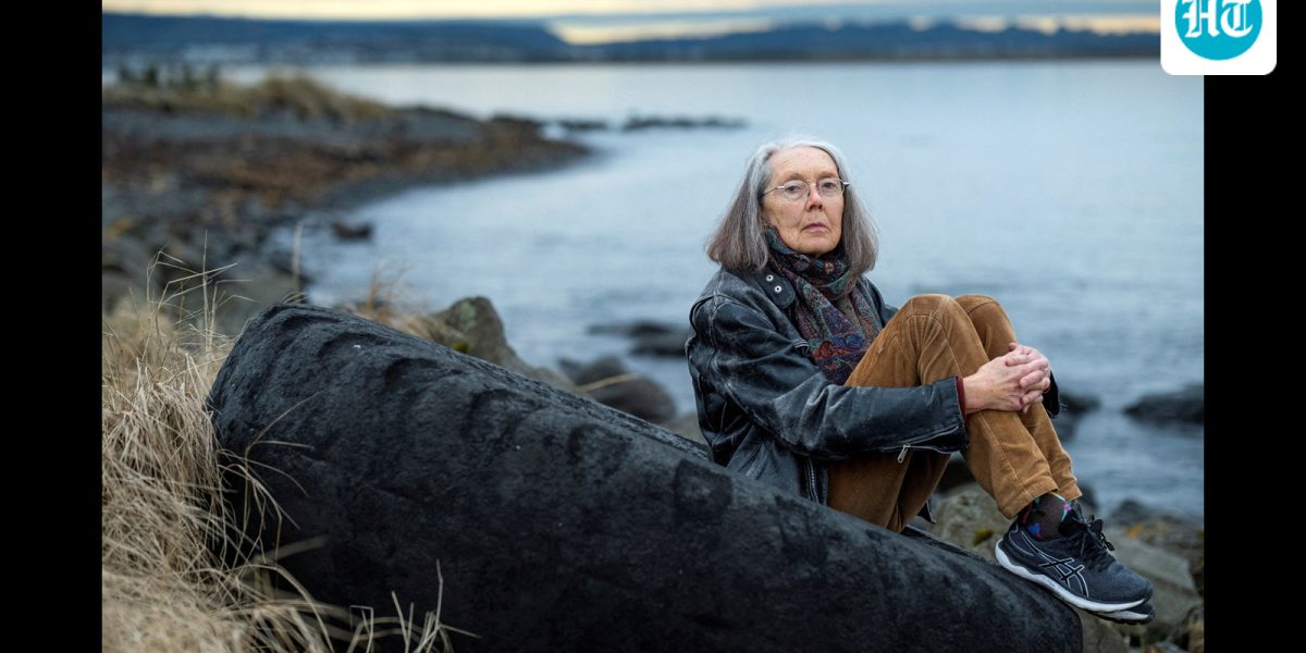 Anne Carson, winner of the Nobel Prize for Literature sits outside her home in Reykavik