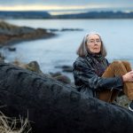 Anne Carson, winner of the Nobel Prize for Literature sits outside her home in Reykavik