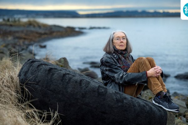 Anne Carson, winner of the Nobel Prize for Literature sits outside her home in Reykavik