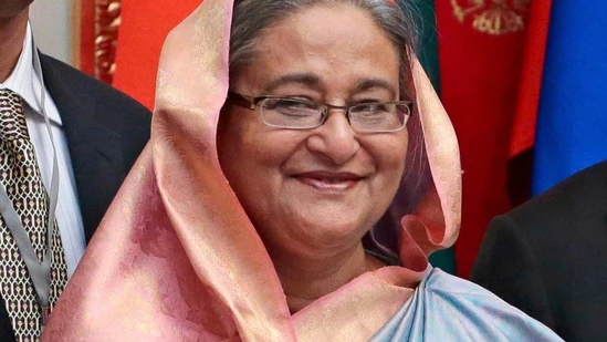 FILE-Tulip-Siddiq-left-stands-beside-Banglades_1782010130368_1782010150162_f768cf1d-fd7a-4284-ba2b-39e0422a57fa
