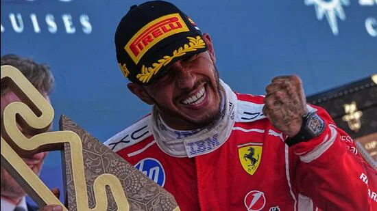 Ferrari-driver-Lewis-Hamilton-celebrates-after-win_1781457352777