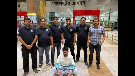 Gangster-Dinesh-in-Haryana-STF-custody-following-h_1781289960317