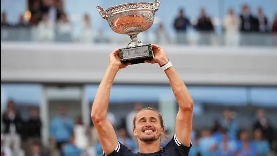 Germany-s-Alexander-Zverev-lifts-the-trophy-after-_1780856690669