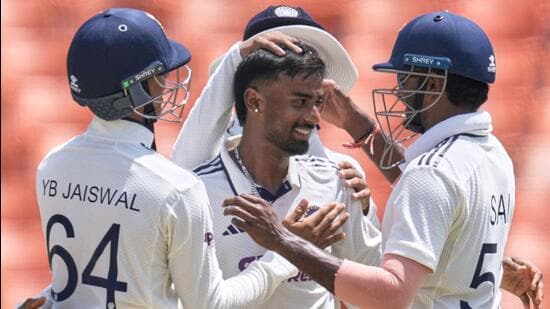 India-s-Manav-Suthar-C-is-congratulated-by-teamm_1780926314433
