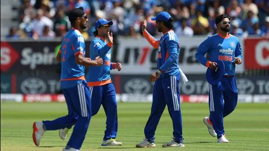 India-s-players-celebrate-the-wicket-of-Ireland-s-_1782670290465