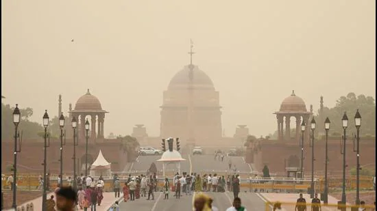 People-seen-out-during-a-sudden-dust-storm-over-Ka_1781068083305