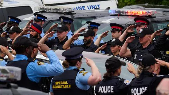 Police-salute-during-a-procession-with-the-body-of_1781240504175