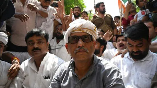 UP-Congress-president-Ajay-Rai-sat-on-the-road-in-_1784732956341