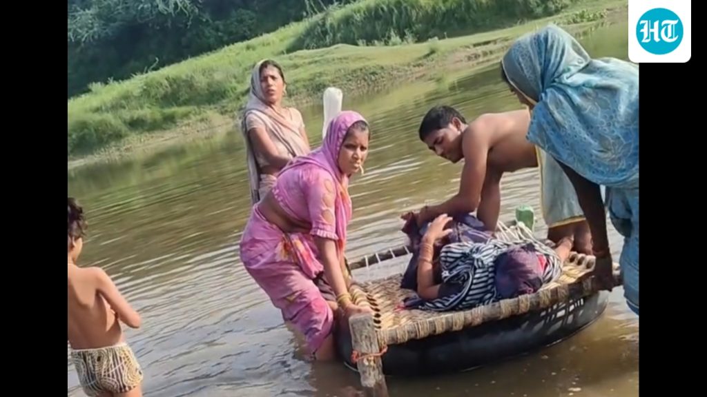Woman-and-her-newborn-being-carried-across-the-Uta_1786732125283