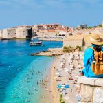 A,Traveler,Gazes,Out,At,The,Dazzling,Adriatic,Sea,From