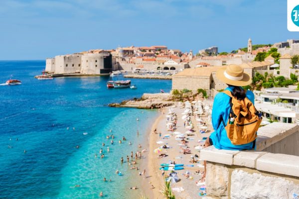 A,Traveler,Gazes,Out,At,The,Dazzling,Adriatic,Sea,From